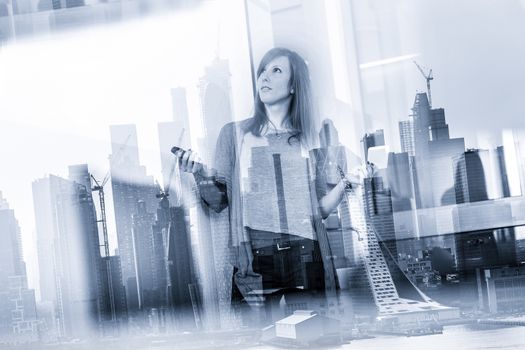 Business woman making presentation in startup office. Business executive delivering a presentation during business meeting against new york city manhattan buildings and skyscrapers window reflection.