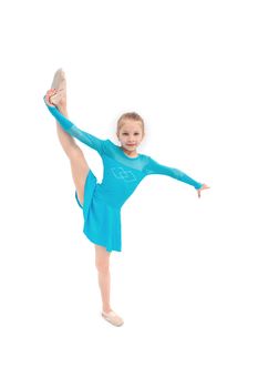 Flexible gymnastic girl with leg up isolated on white background