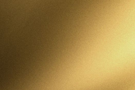 Abstract texture background, light shining on gold metallic wall in dark room