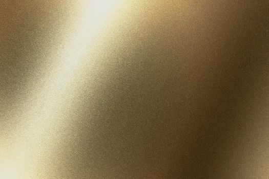 Abstract texture background, light shining on golden metal in dark room