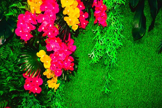 background composition with flowers made of artificial materials
