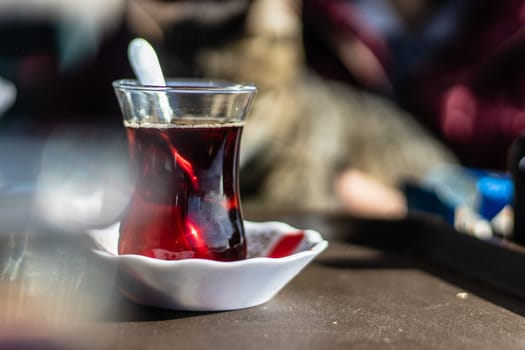 a closeup shoot to tea with traditional turkish thin belly glass. photo has taken at izmir/turkey.
