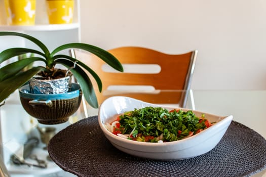 a good looking closeup side view shoot of seasonal salad and flower pot. photo has taken from aydin/turkey.