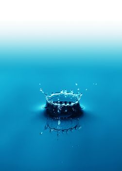 Nice abstract blue water splash on gradient background