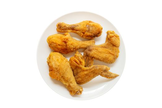Table top view plated of full original recipe fried chicken, isolated on white background.