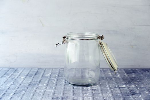 Empty glass money jar, financial concept. 