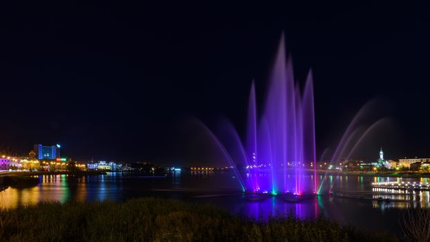 Fountain view in Kazan city during a beautiful summer night. waterfront of Kaban Lake.