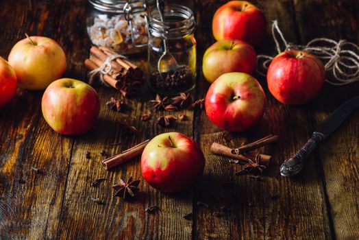 Red Apples with Different Spices for Cooking Apple Grog.