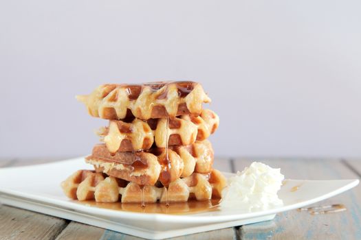 Maple syrup waffle with whipped cream