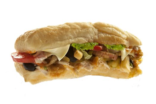 Mighty sub hoagie sandwich with fries meat and veggies