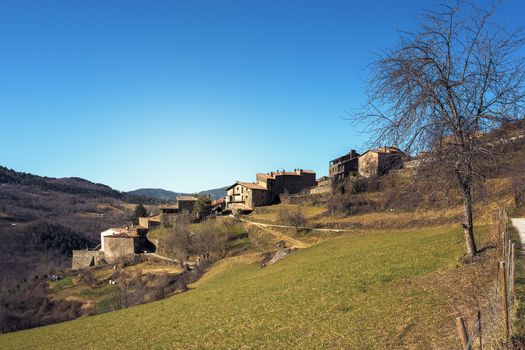 ancient village on the slope of the valley with blue clear sky, copy space for text