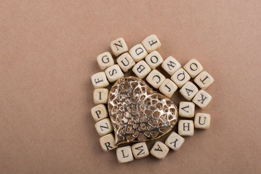 Metal Love icon and Letter cubes of made of wood