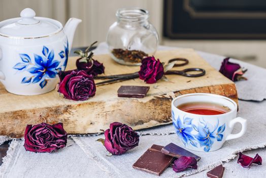 Cup of Tea with Roses and Chocolate.