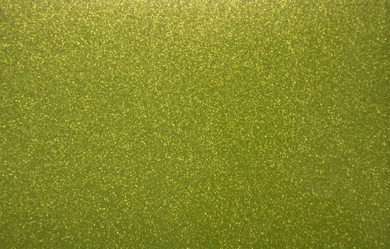 Green pearlescent transparent background with metal splashes. Background. Texture.