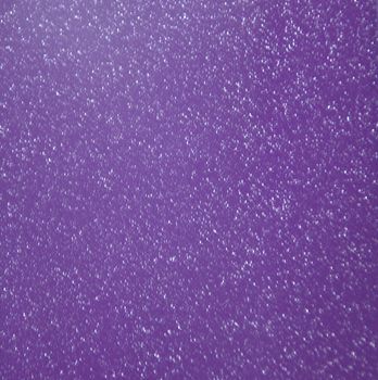 Purple background with silver glitter under the metal. Background, texture.