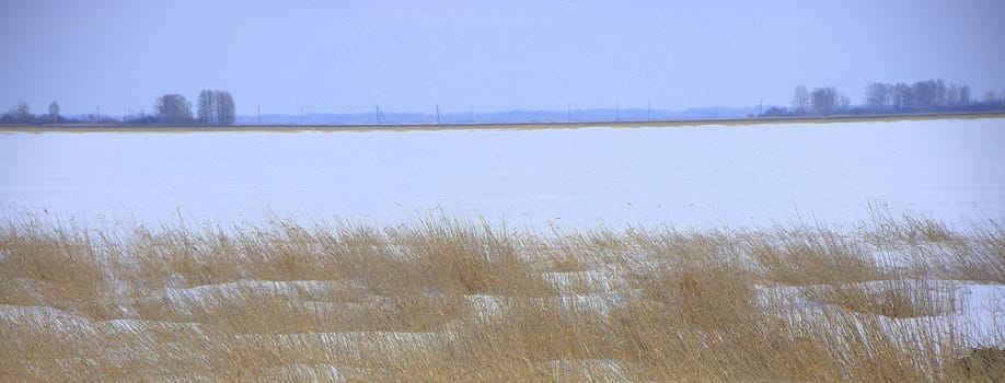 Melted and broken ice. Snapshot on open space. Panoramic shot.