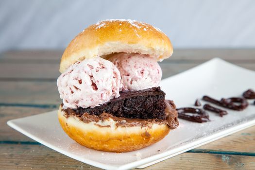 Strawberry donut ice cream sandwich close up