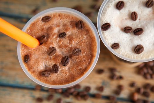 Iced frappes closeup with coffee beans