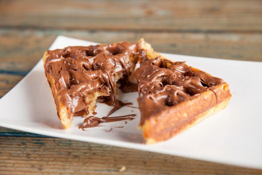 Nutella waffle pancake chocolate snack cut in to half