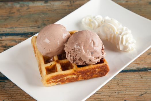 Ice cream waffle and whipped cream