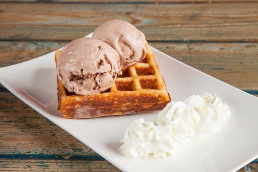 Ice cream waffle and whipped cream