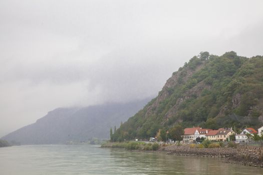 Wachau valley in Austria, stormy clouds above the mountains