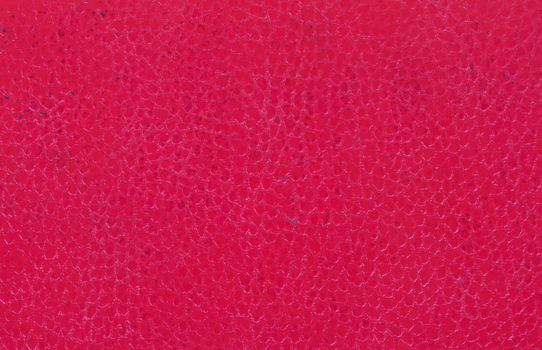 Bright red leather background, part of an old binder folder