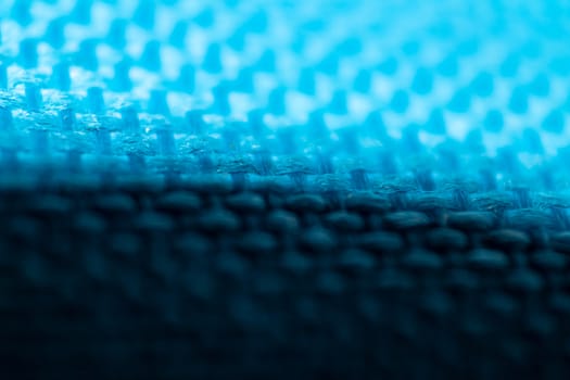 an interesting macro shoot of swollen braided blue cloth texture. bottom side of picture got shadow.
