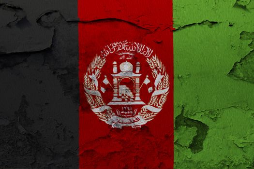 Afghanistan flag painted on the cracked concrete wall