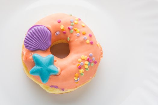 Donut on a white plate, donut with white background
