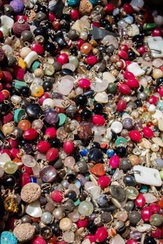 Colorful beads of various color at a market