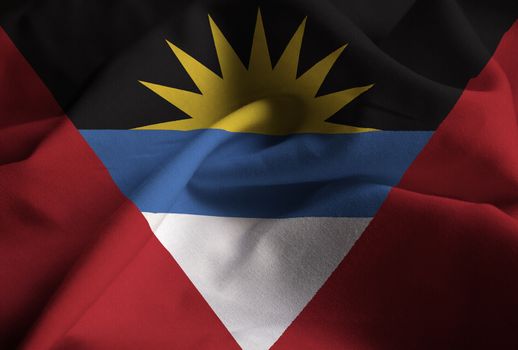 Ruffled Flag of Antigua and Barbuda Blowing in Wind