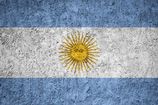 Argentina flag painted on the cracked grunge concrete wall