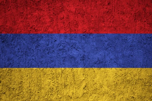 Armenia flag painted on the cracked grunge concrete wall