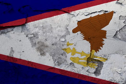 American Samoa flag painted on the cracked grunge concrete wall