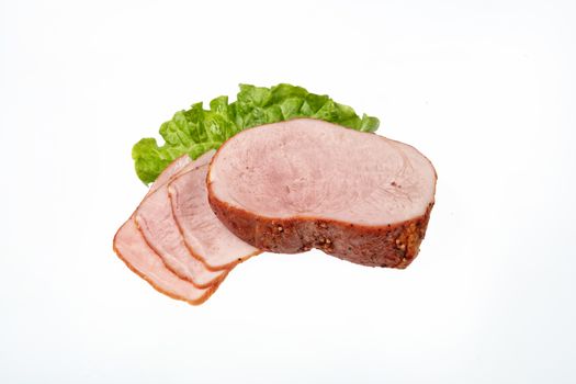 Smoked beef and greenery on an isolated studio background