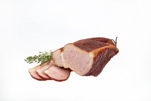 Smoked beef and greenery on an isolated studio background