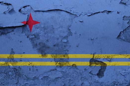 Aruba flag painted on the cracked grunge concrete wall