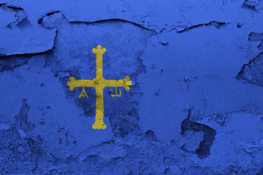 Asturias flag painted on the cracked grunge concrete wall