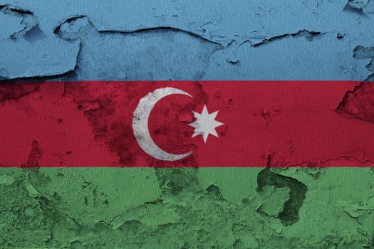 Azerbaijan flag painted on the cracked grunge concrete wall