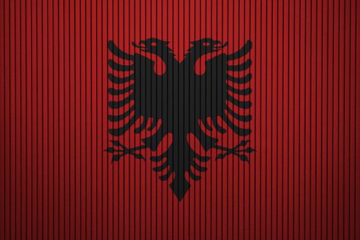 Albania flag painted on the cracked grunge concrete wall