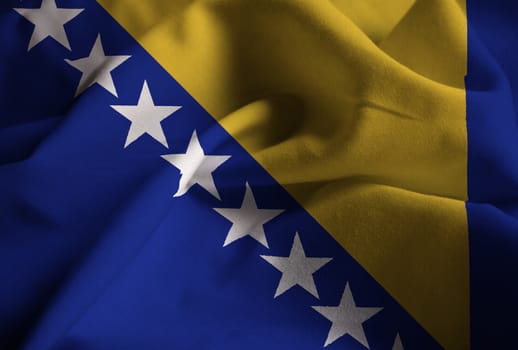 Ruffled Flag of Bosnia and Herzegovina Blowing in Wind