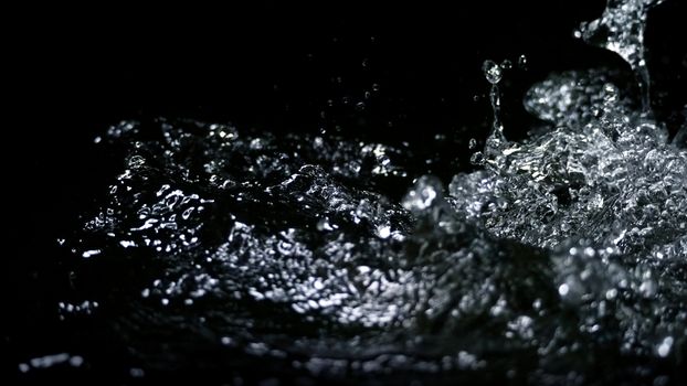 Blurry images of drinking water liquid wave or carbonate drink or oil shape or soda splashing and floating drop in black background for represent sparkling refreshment and refreshing