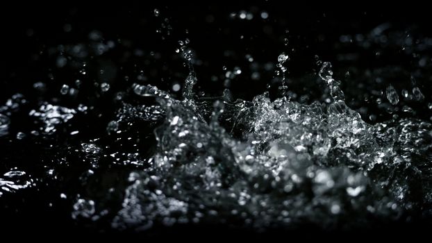 Blurry images of drinking water liquid wave or carbonate drink or oil shape or soda splashing and floating drop in black background for represent sparkling refreshment and refreshing