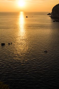 Beautiful sunset view from Paleokastritsa monastery, Corfu island, Greece.