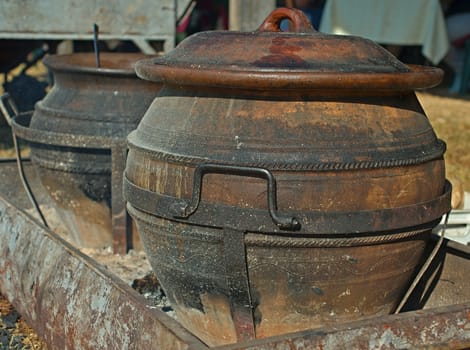 Two old traditional pots for cooking outdoor