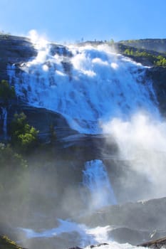 View on Langfossen Langfoss waterfall in summer, Etne, Norway