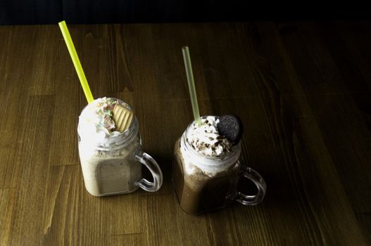 the service desk with a glass of iced tea and placed a glass of cold chocolate