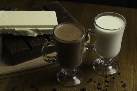 molded chocolates with exotic drinks with milk and chocolate