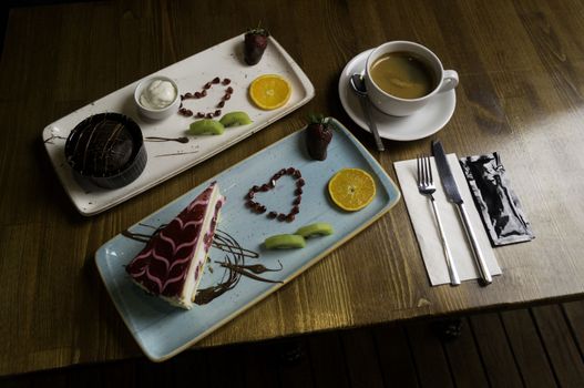 In carefully crafted serving tray cake and sweets